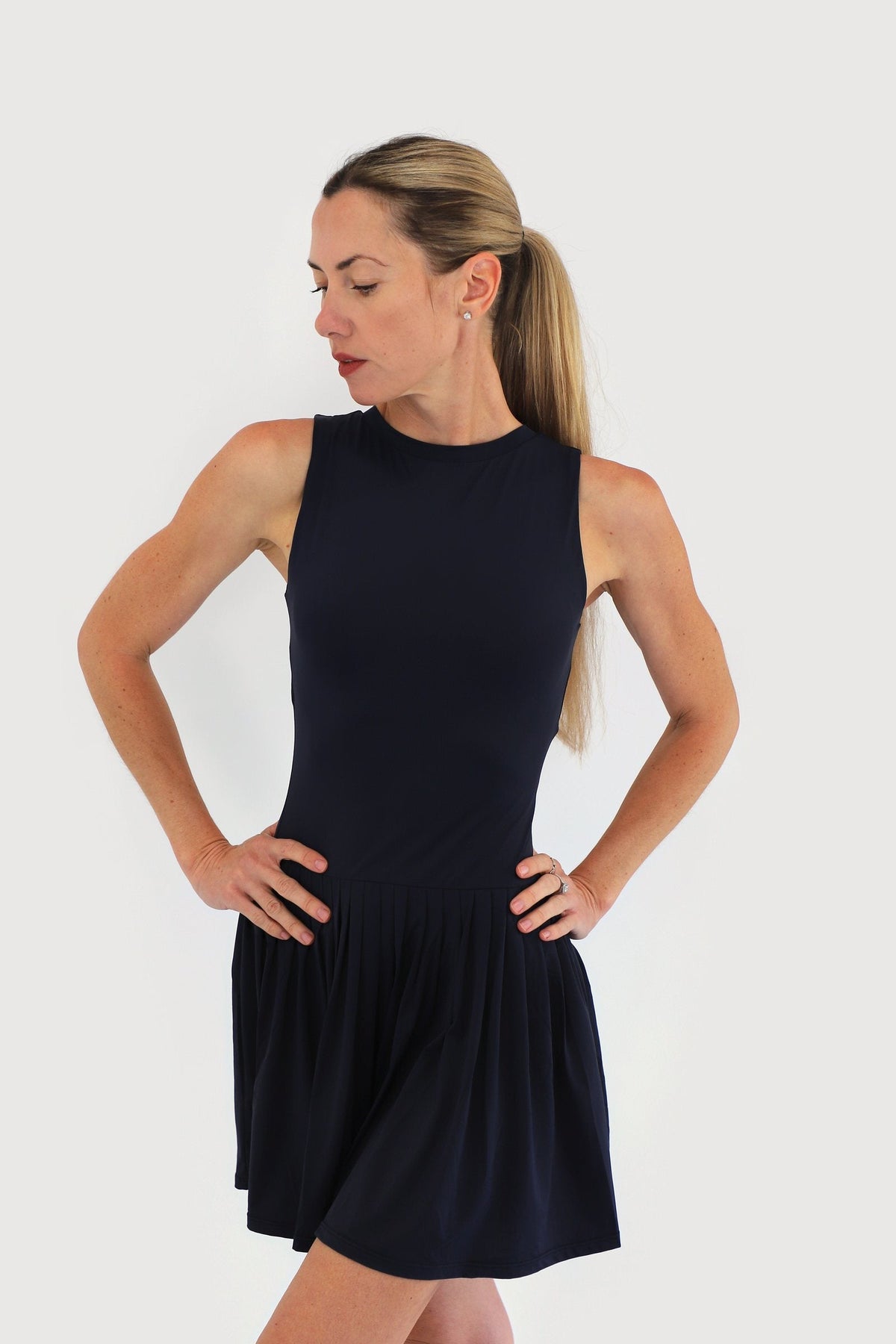 Mist Dress in Navy, three-quarter view showing the gathered skirt