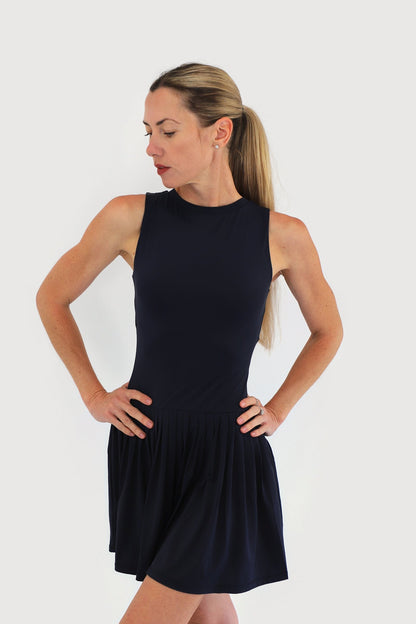 Mist Dress in Navy, three-quarter view showing the gathered skirt