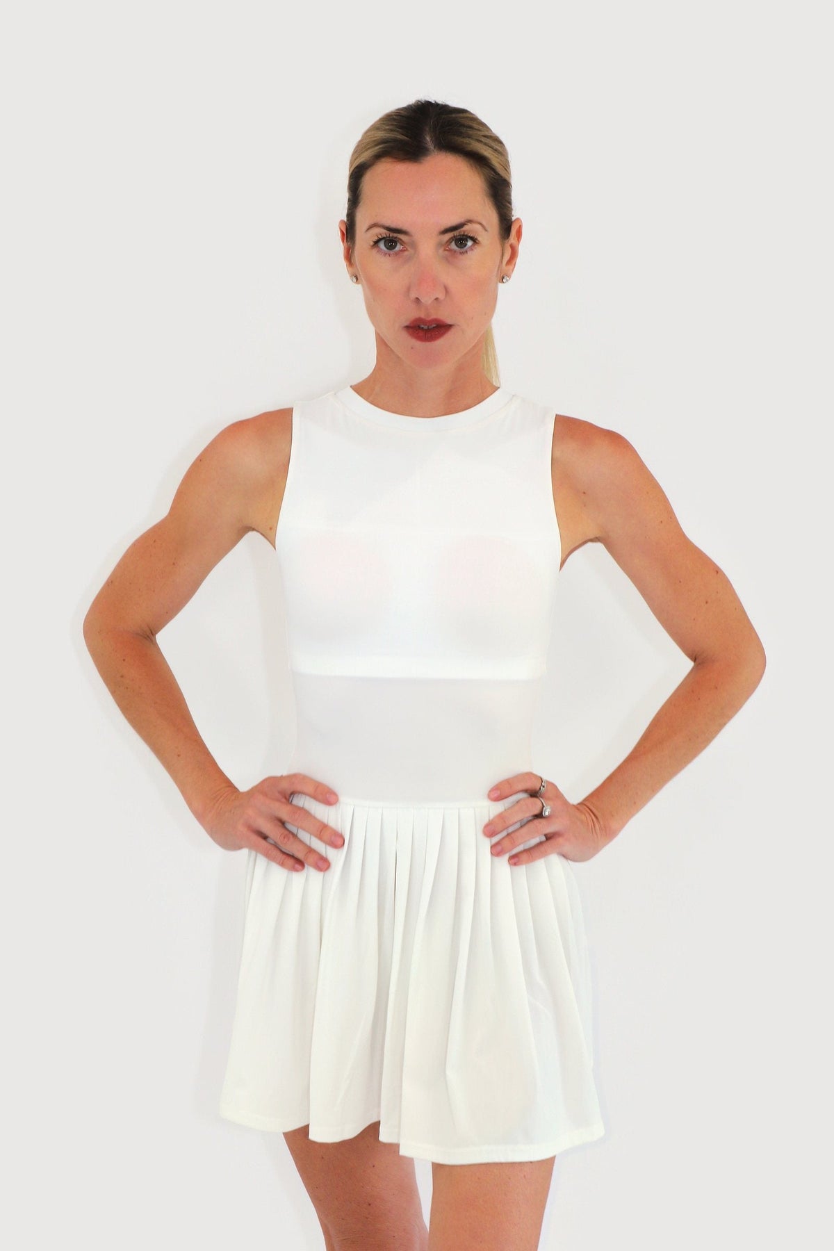 Mist Dress in White, front view with sleeveless high-neck bodice and gathered skirt