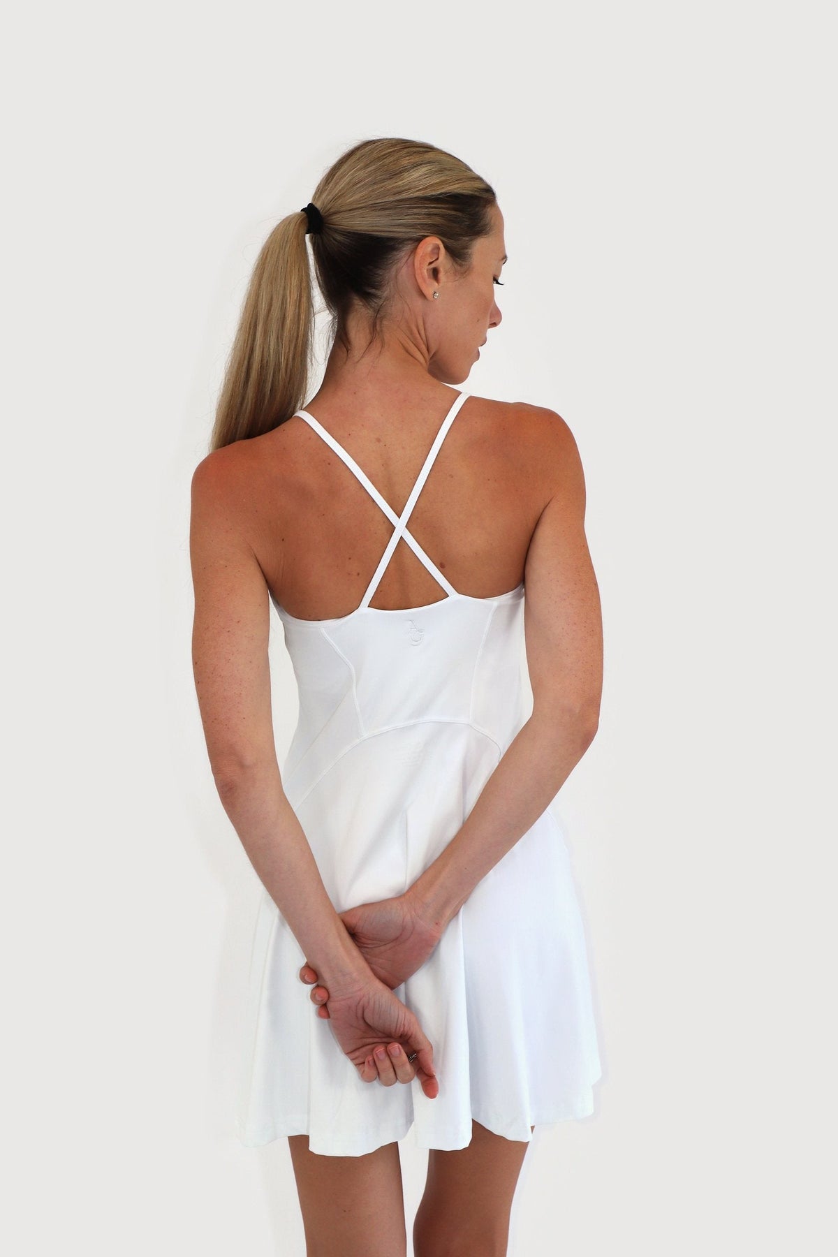 Pacific Dress in White, back view showing the cross-back straps