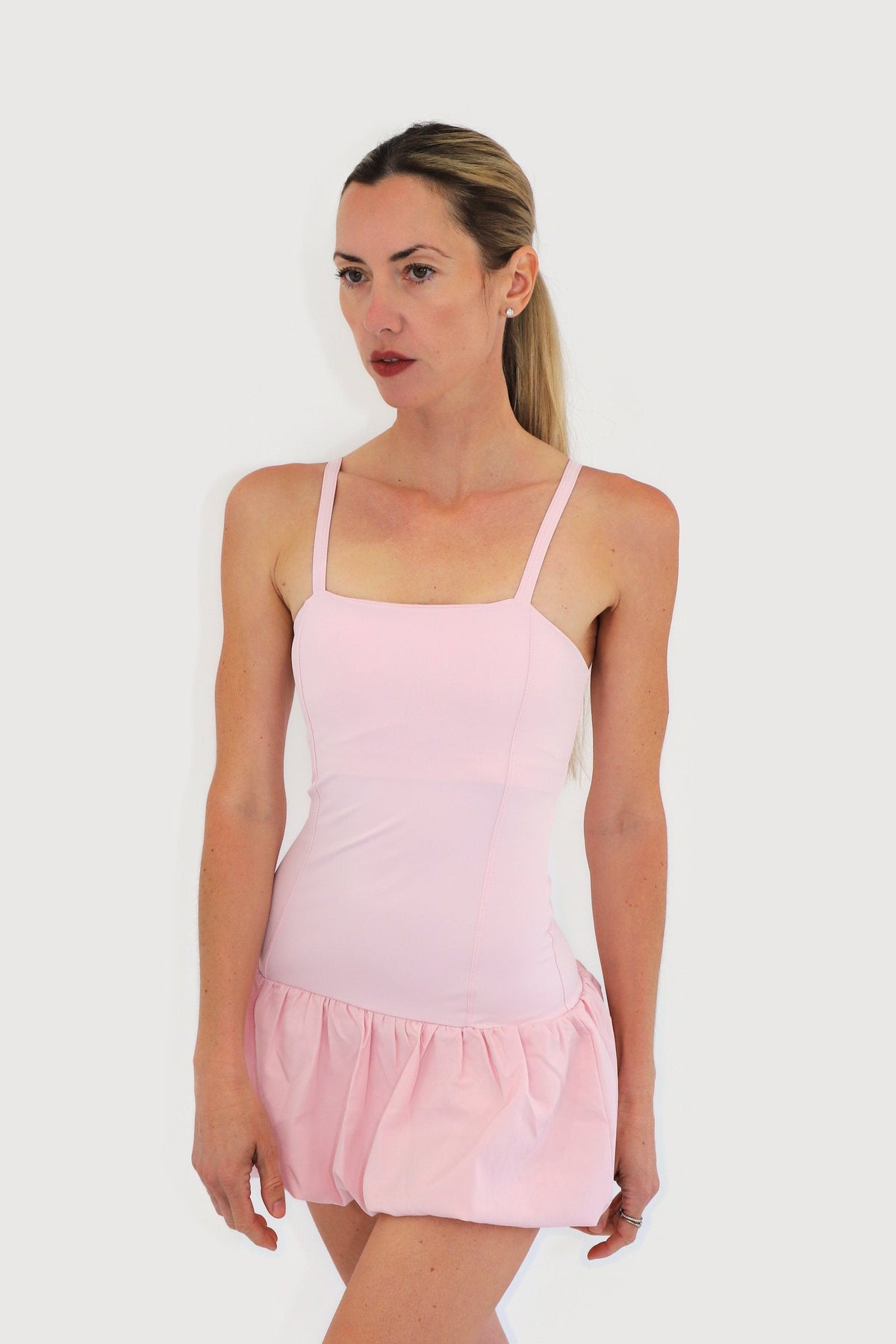 Shore Dress in Pink, front view: thin straps, straight neckline and bubble-hem skirt