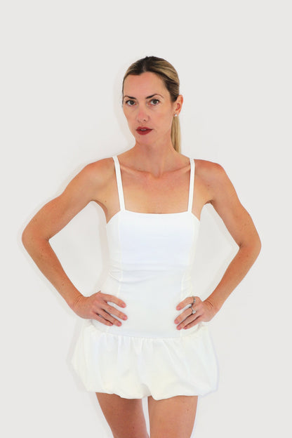 Shore Dress in White, front view with thin straps and bubble-hem skirt